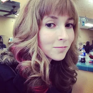 New &apos;do accompanied by a little stripe of color.