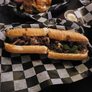two sandwiches on a table