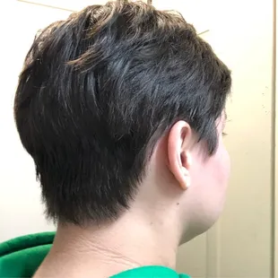 Bald spot behind ear. Bottom also looks sloppy and not blended or faded down.