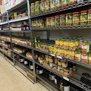 shelves of canned food in a grocery store