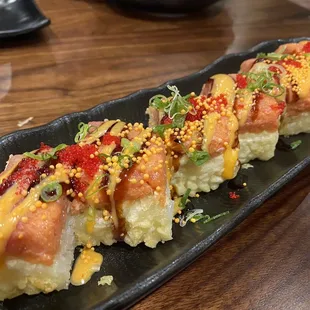 a close up of a plate of sushi