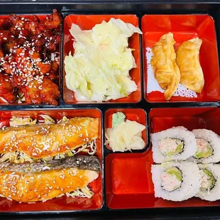 a bento box with a variety of food items