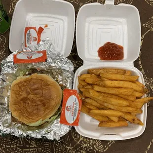 The ketchup packets are to show scale/size of burger.