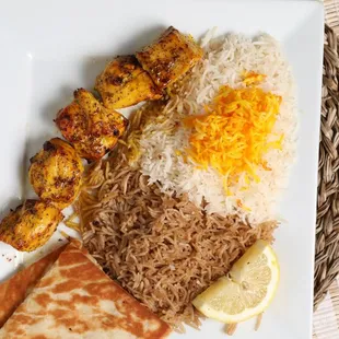 Chicken Kabob
Marinated pieces of boneless chicken cooked on the grill, and rice.