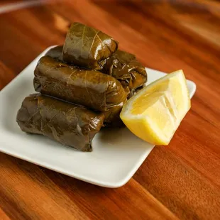 Dolma (6)
Vegetarian stuffed grape leaves.