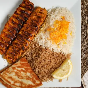 Koobideh (Chicken)
Two skewer of ground chicken mixed with spices and grated onion, and rice.