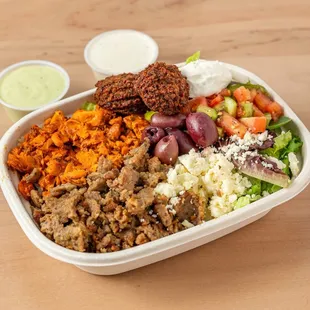 Chicken and lamb with salad and rice