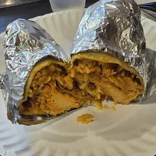 Spicy chicken, spicy rice, spicy hummus, and spicy sauce in a wrap!