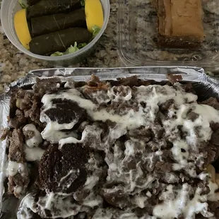 Loaded fries, dolma, baklava