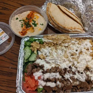 Combo rice, hummus and pita.