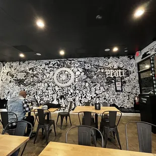 Seating area, check out that amazing mural by Derek &quot;Dee&quot; Magee.