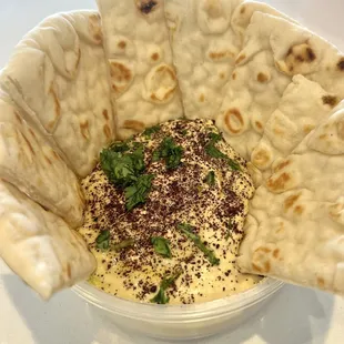 Our fresh made hummus comes with pita bread.
