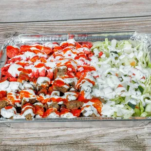 a tray of vegetables and meat