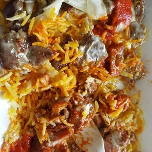 Chicken and lamb over rice platter