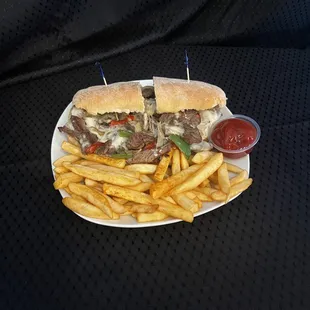 Philly Cheese Steak Sandwich and Fries