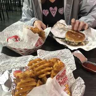 Mushroom Swiss burger  and signature burger 2 with waffle fries.