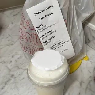 Signature Burger 2 with caramel milkshake and waffle fries.