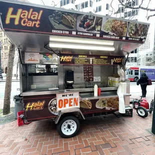 a food cart on a city street