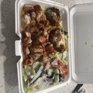 Chicken and falafel combo over rice