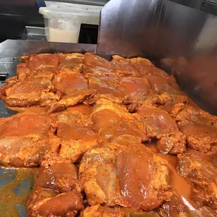 chicken cooking in a kitchen