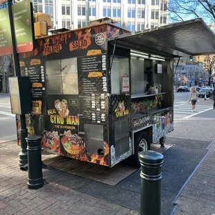 a food cart on a city street