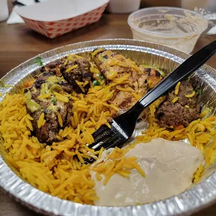 Kafta, chicken,  and rice with hummus.