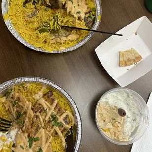 The best hummus and taziki you will EVER try! One mixed bowl and one chicken bowl.