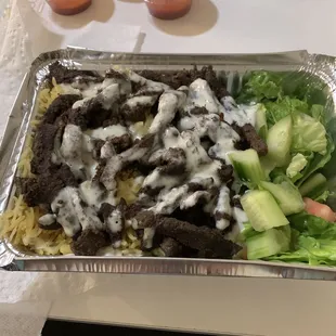 Lamb shawrma over rice $13.99