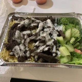 Lamb shawrma over rice