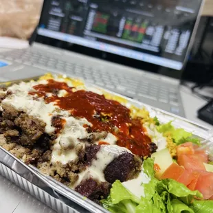 Combination chicken/gyro over rice with Salad over combo( chiken&amp;gyro)
