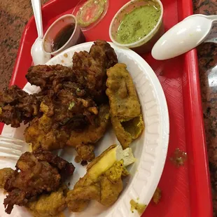 Freakishly delicious vegetable pakora and chicken fritters! Good quality chicken white meat, fresh of the fryer, not greasy at all