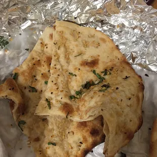 Their garlic naan (it cuts into 4 pieces)