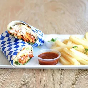 a sandwich and fries on a plate