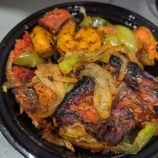 Tandoori mix featuring shrimp and chicken.