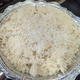 Rice portion for delivery/pickup, we received 3 platters of rice with our meal, one for each entree.