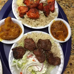 Lamb kabob platter with chicken curry as a side. Chicken kabob platter with potatoes as a side