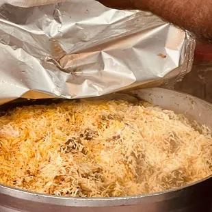 Getting the first pick of fresh homemade Goat Biryani!!!