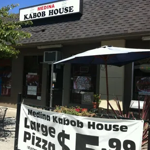a sign for a large pizza restaurant