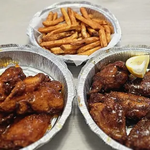 Lemon pepper and Mango habanero  chicken wings. Order of fries