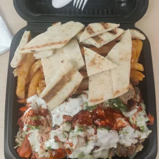 Combo on rice with half pita and double fries $13