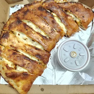 Chicken and broccoli calzone (minus the onions), $11.99. Delicious!