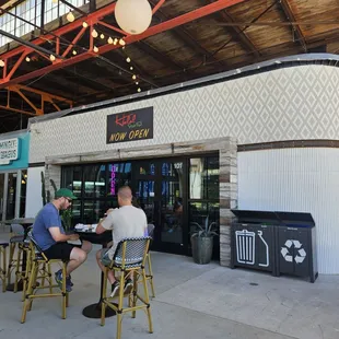 Store front and patio seating.