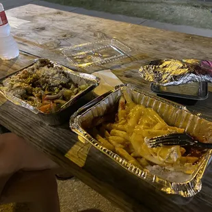 Combination plate, cheese fries and hummus.