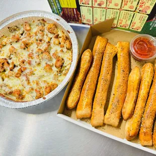 Chicken Alfredo Pasta with breadsticks
