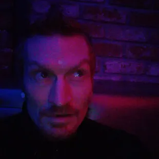 a man staring at the camera