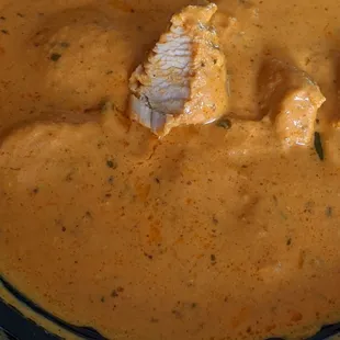 Chicken Korma - smooth, very oniony sauce, and large slightly dry chunks of white chicken breast.