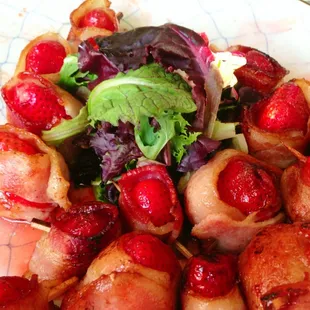 Strawberries wrapped in bacon w/lemon gastrique sauce.