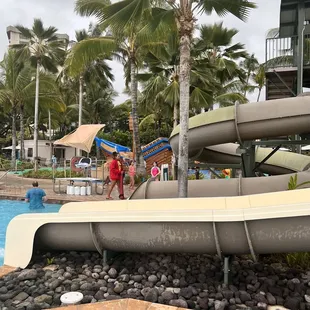 Life guides monitor the red/green light before kids have to run up and slide down.