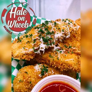 a basket of fried chicken nuggies