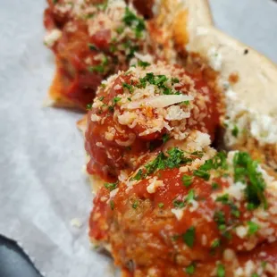 two meatballs on a bun